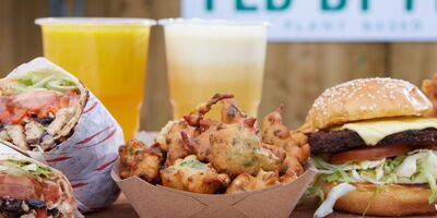 Image of a tray of vegan food and smoothies.