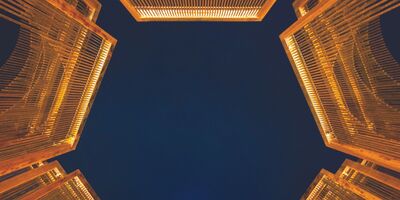 Image of an art installation lit up at night.