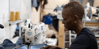 Ari sewing.