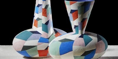 Image of two colourful vases.