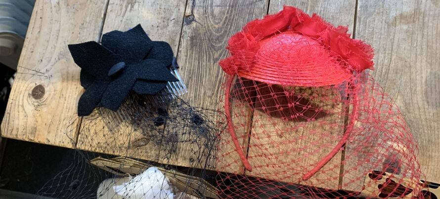 Janice's fascinators in red and black