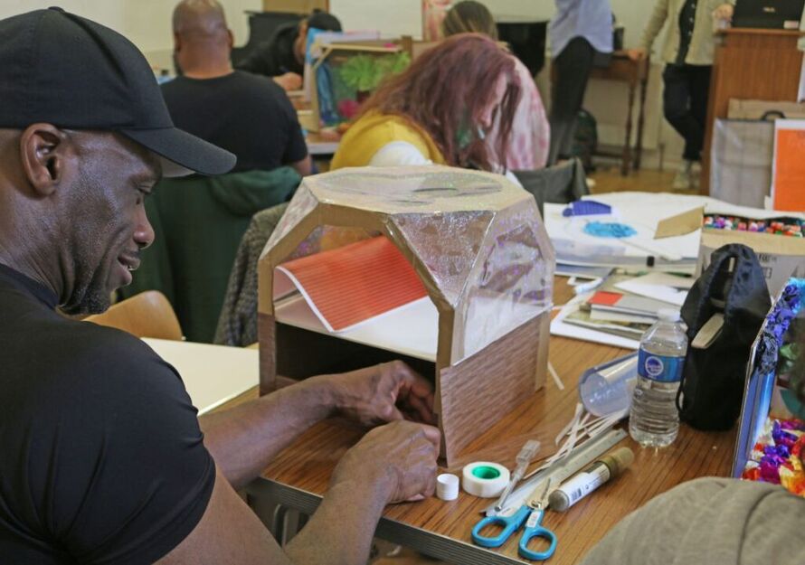 An artist creating their work