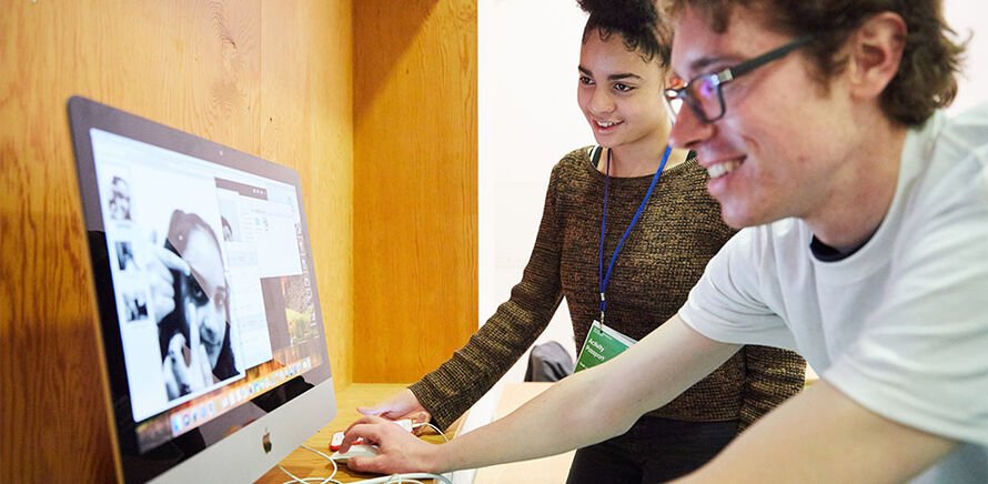 Two young people on a computer